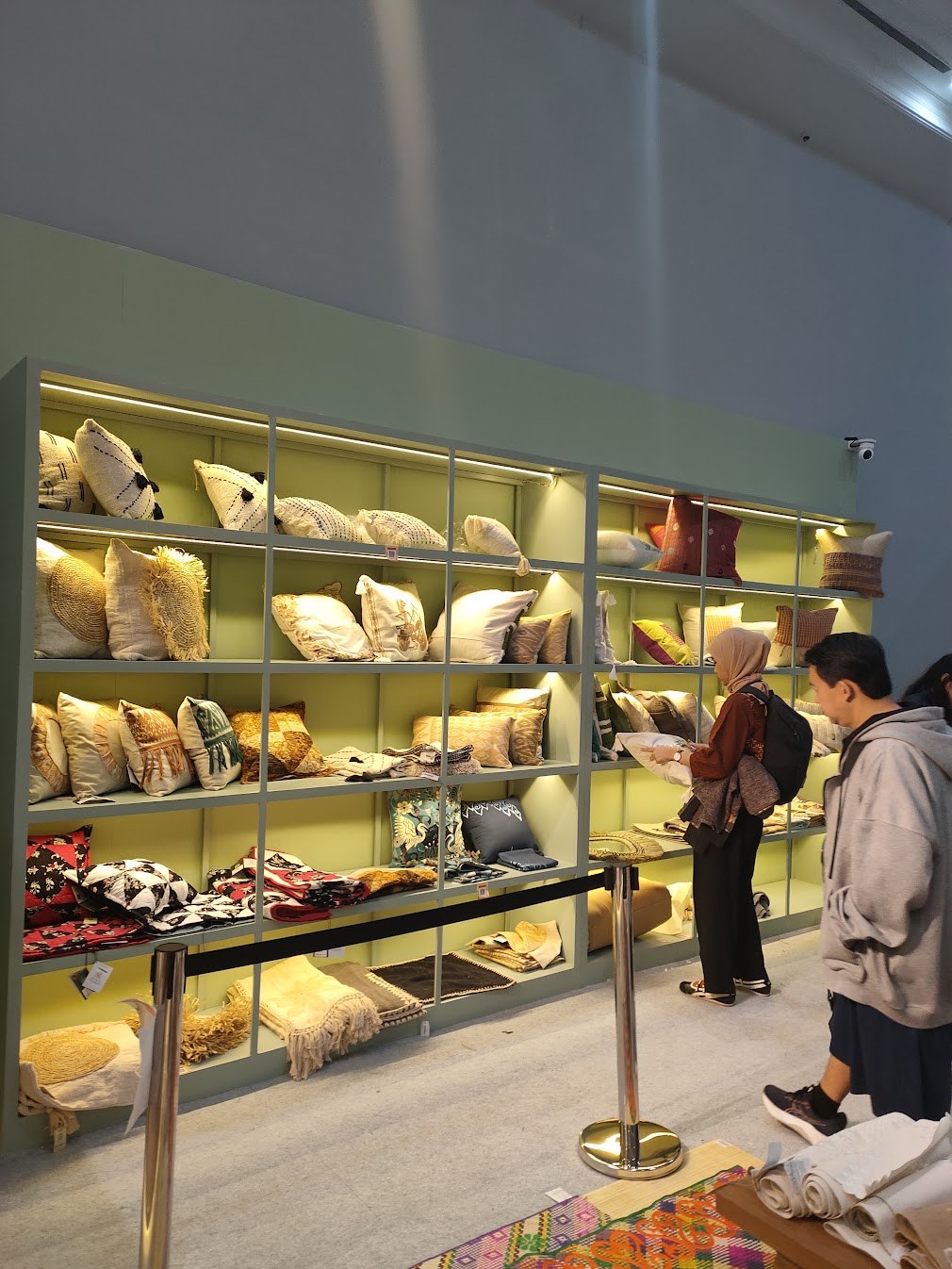 Indonesian textile and homeware products presented in a contemporary retail environment at KKI